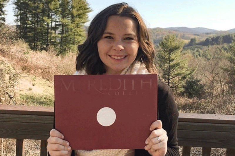 student with acceptance letter