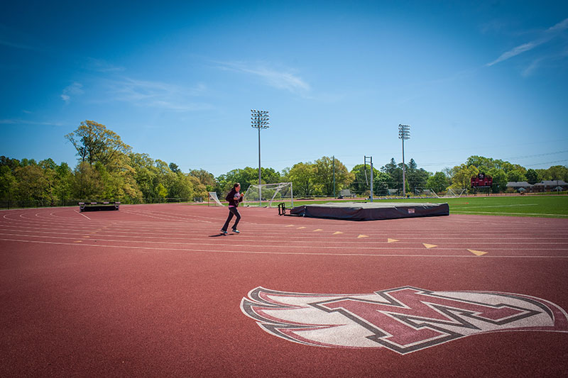 The Meredith Avenging Angels logo on the Meredith College track.