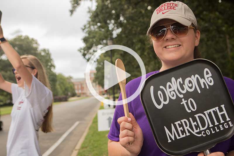 click on photo of student cheering to watch the Welcome to Meredith 2022 video in modal