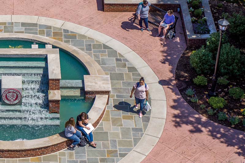 Aerial view of students at Beam fountain