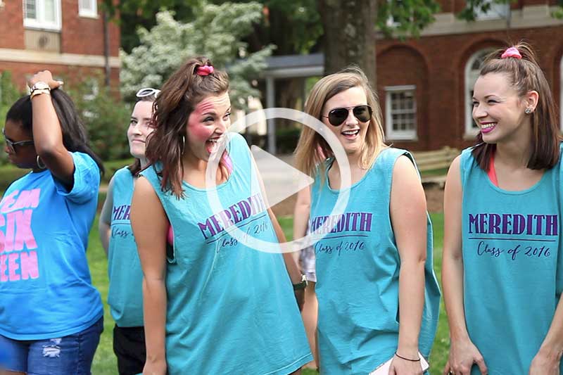 Click  on photo of students gathered in quad to view video in modal of Student Life at Meredith College