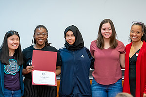 Five people pose with a second award at datafest.