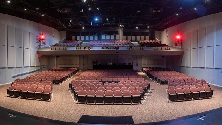 Jones Auditorium interior with new mauve seating.