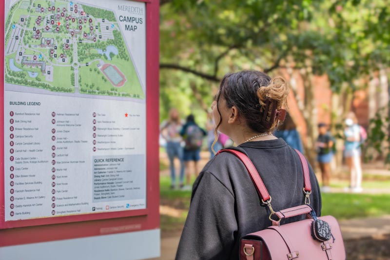 Admitted student looking at campus map