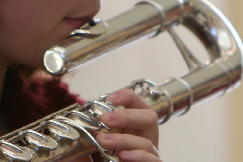 Student playing flute.