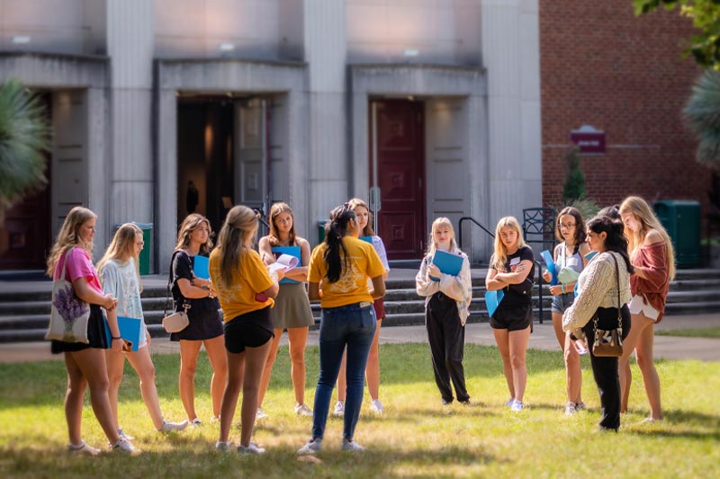 Group of incoming students in front of Jones Auditorium