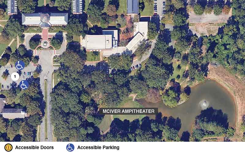 Google earth view of the mcIver Ampitheater with icons showing accessible doors and accessible parking.