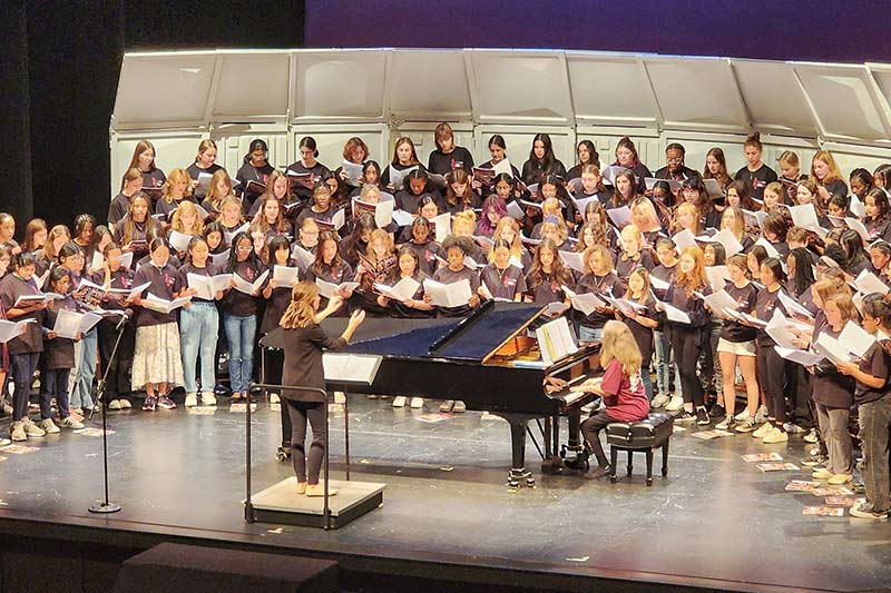 Treblefest Choir in Concert Singing on Stage.