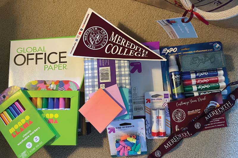 New Teacher Gift Bags with markers, erasures, glue, paper and other school supplies.